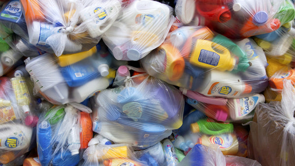 laundry detergent bottles in plastic bags for recycling