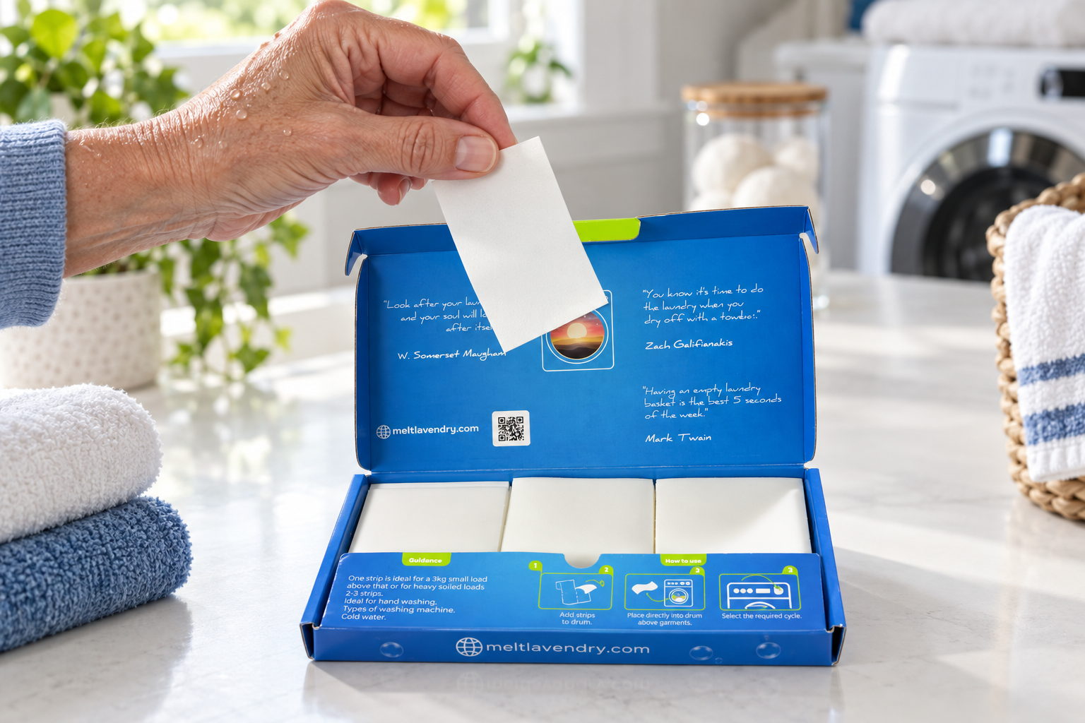 A Melt laundry detergent strip being handled
